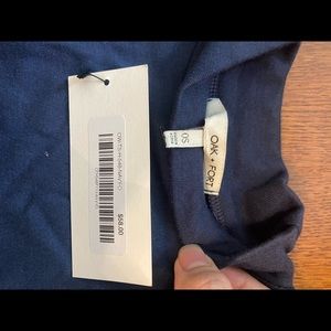 purplish blue long sleeved striped shirt